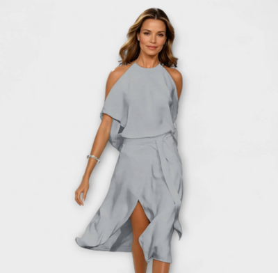 Madonna - Elegant kjole med moderigtige skulderudskæringer