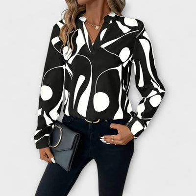 Elegant langærmet bluse med spids udskæring