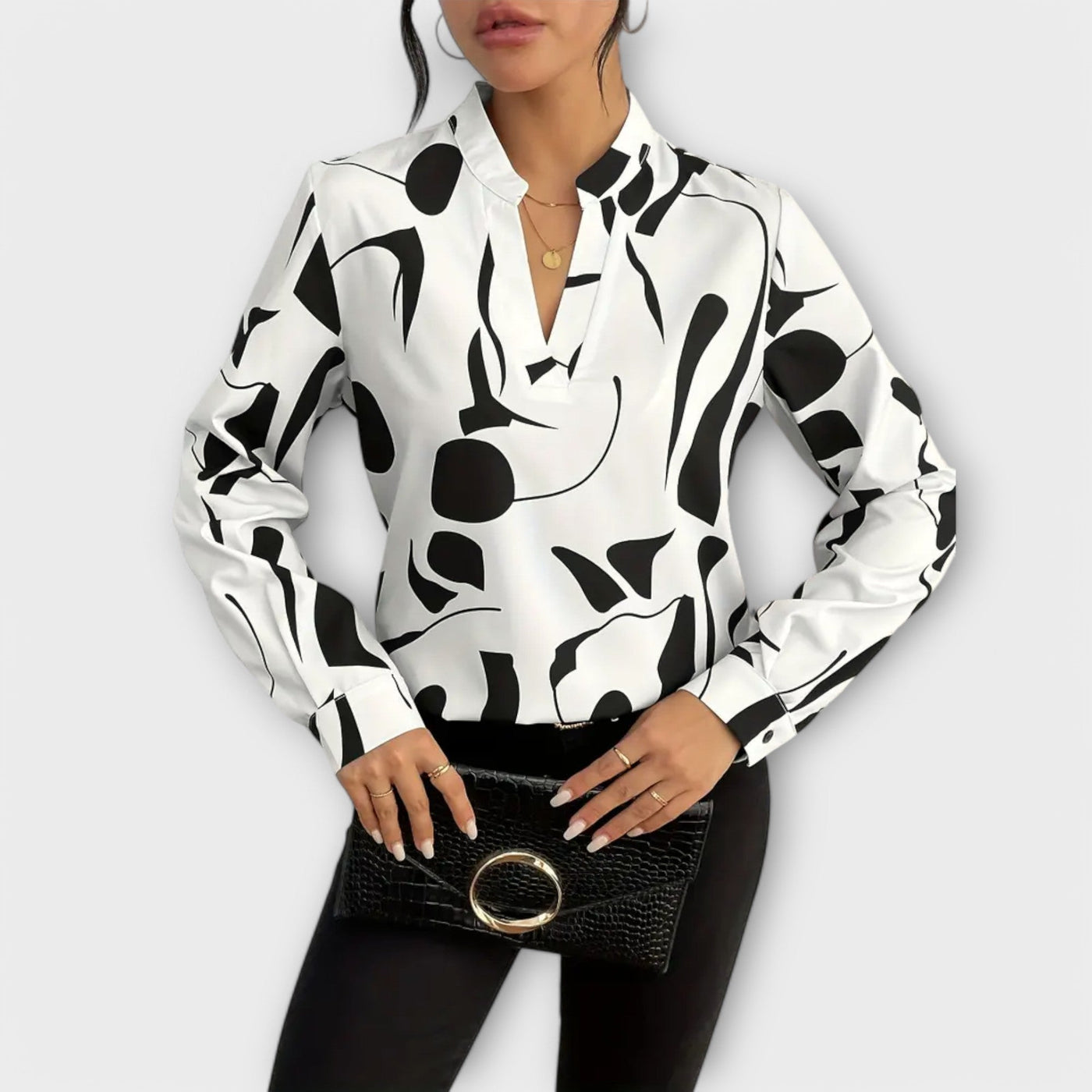 Elegant langærmet bluse med spids udskæring
