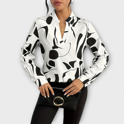 Elegant langærmet bluse med spids udskæring